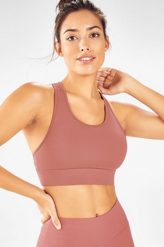 On-the-Go Medium-Impact Sports Bra Fabletics  Medium impact sports bra, Sports  bra, Pink sports bra
