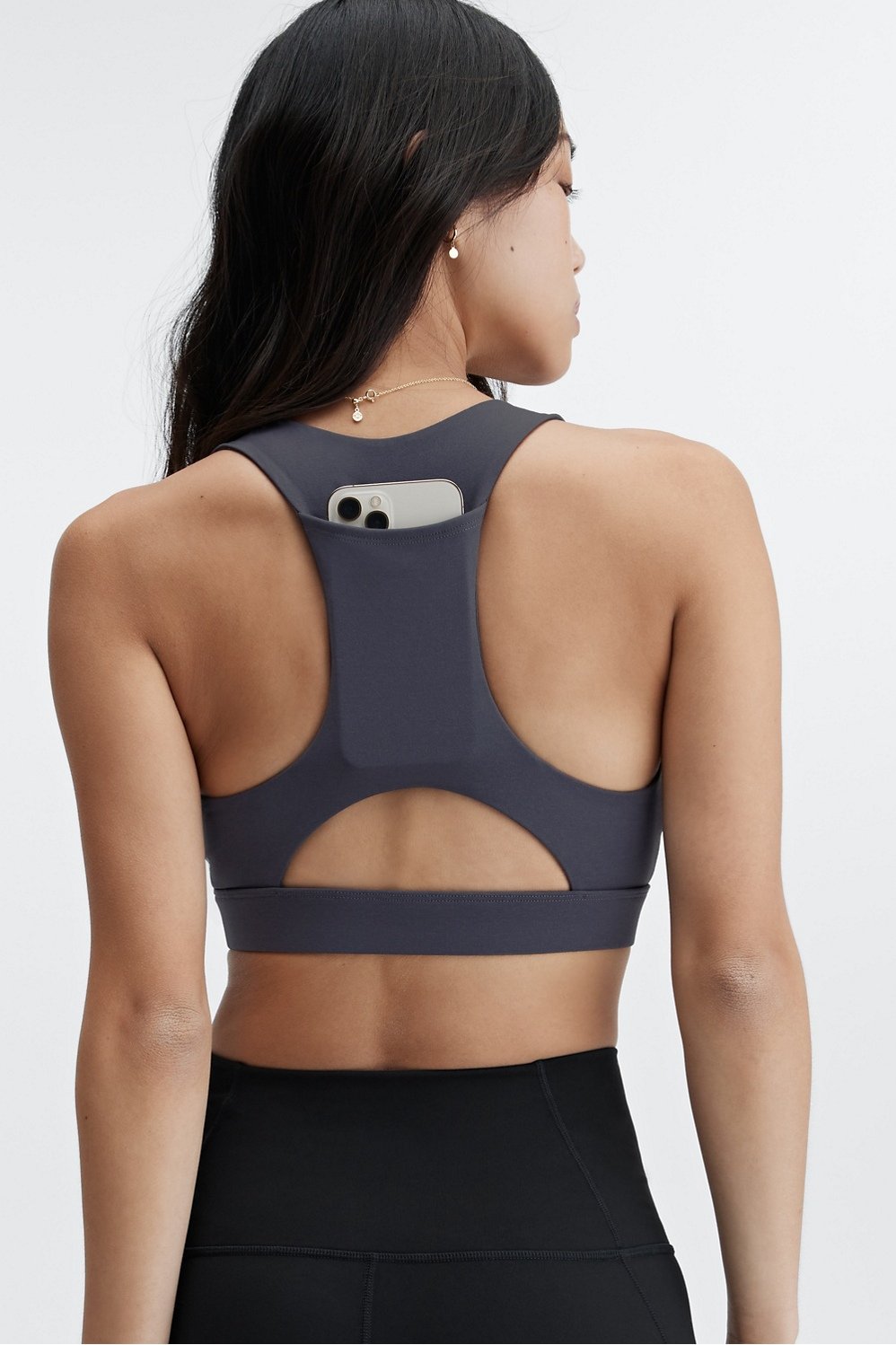 Sole Sports - Now available at Sole Sports the @oiselle Pockito Sports Bra!  This bra provides support, comfort and has pockets for storage! There is a  large center front pocket which can