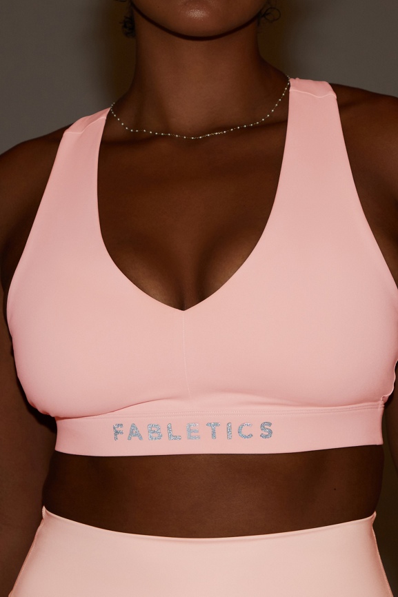On-the-Go Medium-Impact Sports Bra Fabletics  Medium impact sports bra, Sports  bra, Pink sports bra