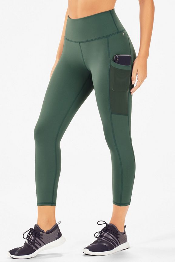 Mila High-Waisted Capri Legging With Pocket in Green | Fabletics