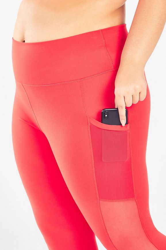 Mila High-Waisted Capri Legging With Pocket in Pop Coral | Fabletics