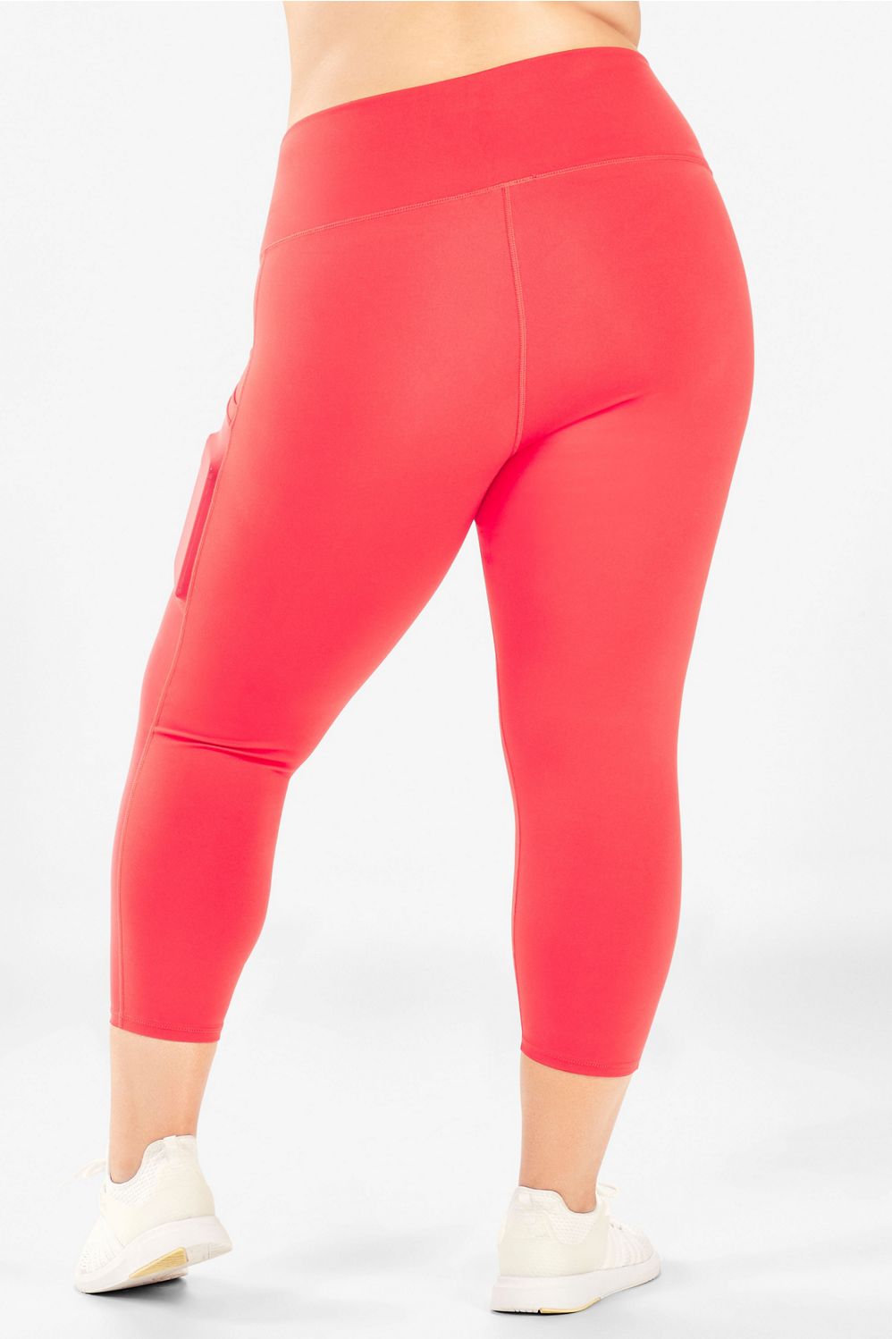 Mila High-Waisted Capri in Fabletics Coral | Legging With Pop Pocket