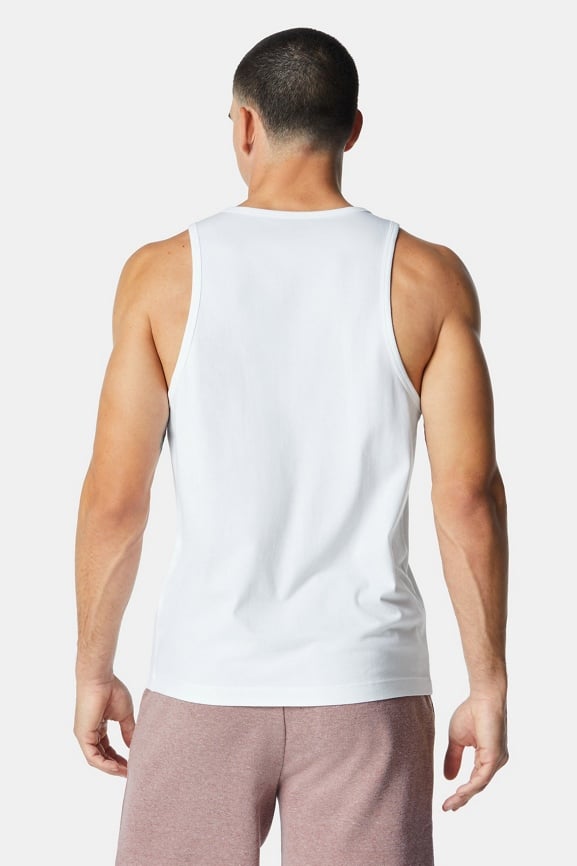 Fabletics white rubbed tank with black trim size - Depop