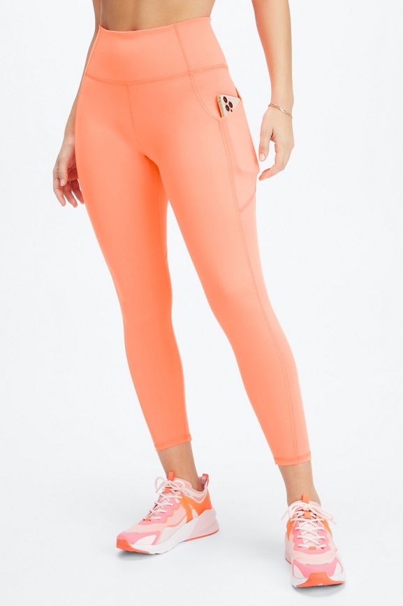 Fabletics Oasis PureLuxe High-Waisted 7/8 Crossover Leggings Orange Size  Medium