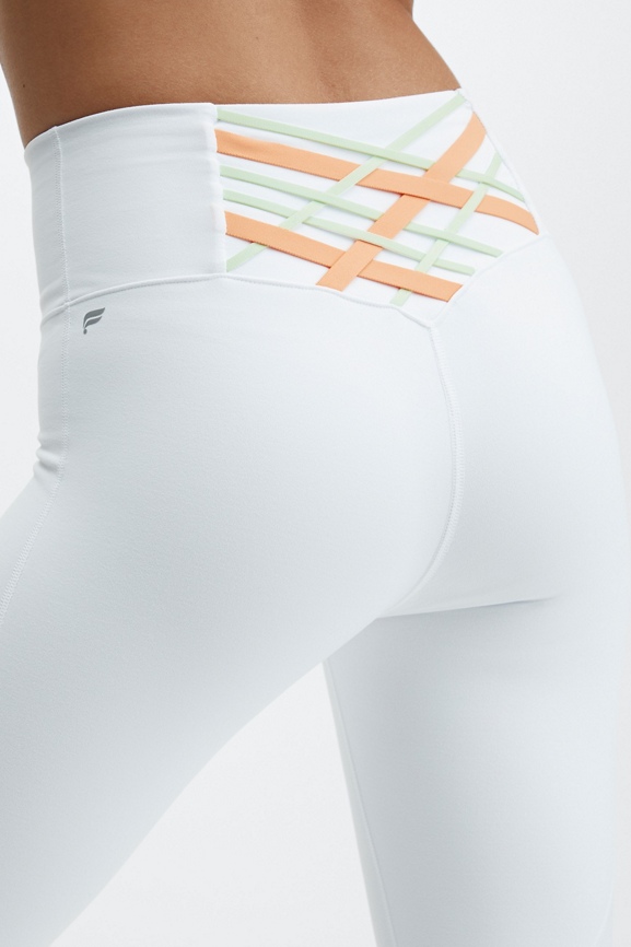 Fabletics 7/8 powerhold leggings with white and - Depop