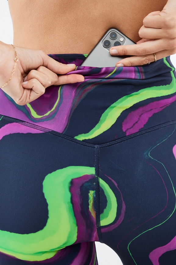 Fabletics Motion360 navy blue. Powerhold camo blue green and purple's.
