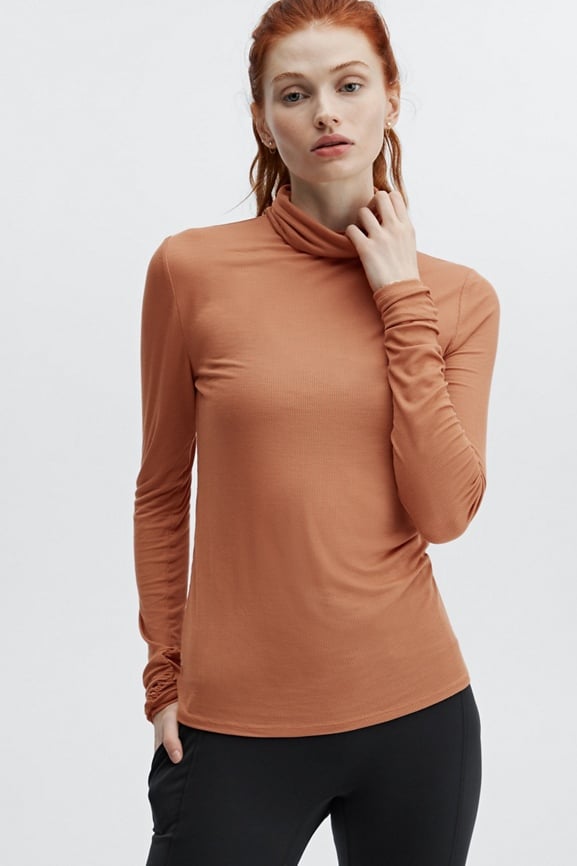 Fabletics Jess Ribbed Fitted Turtleneck  Fitted turtleneck, Clothes  design, Fashion design