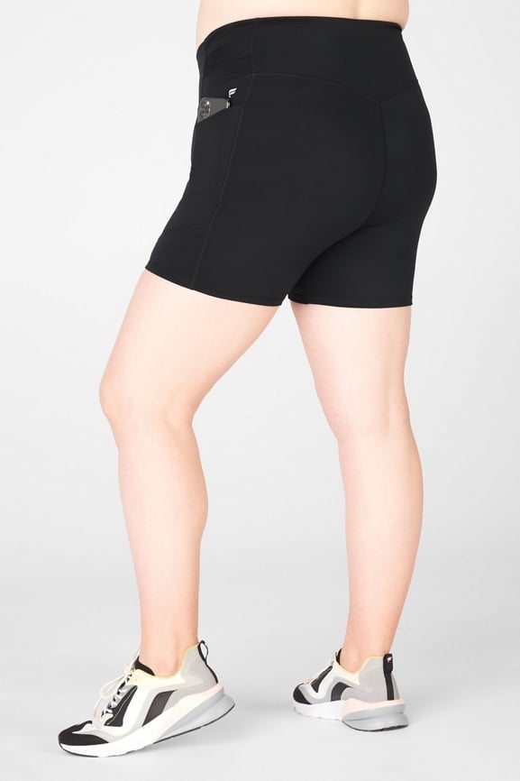 Fabletics Trinity Mid-Rise Pocket Shorts Women's Size XS (4) 9” Inseam  Black EUC